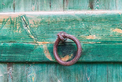 Faiyum-Egypt Iron ring on a green painted wooden gate Art Print